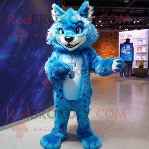 Blue Lynx mascot costume character dressed with a Cover-up and Brooches