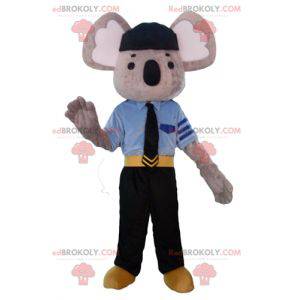 Gray and white koala mascot dressed in police uniform -