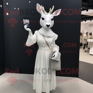 White Deer mascot costume character dressed with a Empire Waist Dress and Clutch bags