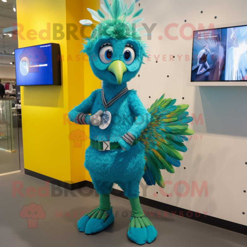 Cyan Peacock mascot costume character dressed with a Shorts and Smartwatches Cyan Peacock mascot costume character dressed with a Shorts and Smartwatches
