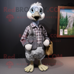Gray Gosling mascot costume character dressed with a Flannel Shirt and Clutch bags