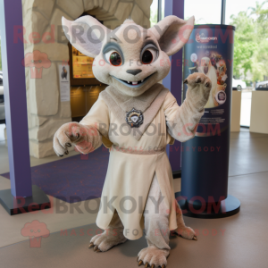 Beige Gargoyle mascot costume character dressed with a Wrap Dress and Keychains