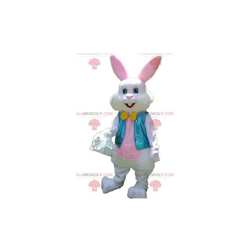 Mascotte coniglio bianco e rosa con un giubbotto blu -
