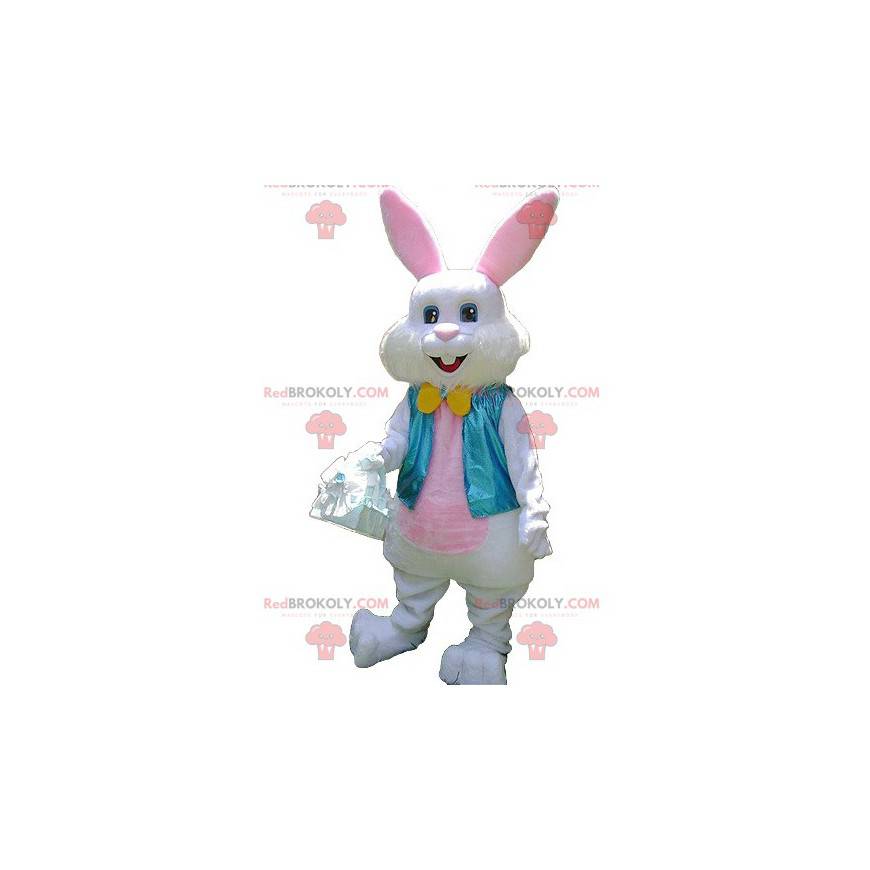 Mascotte de lapin blanc et rose avec un gilet bleu -