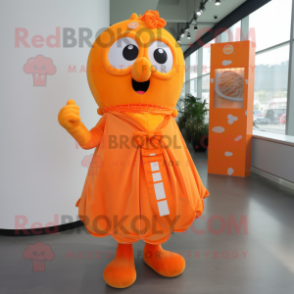 Orange Candy Box mascot costume character dressed with a Dress and Scarf clips