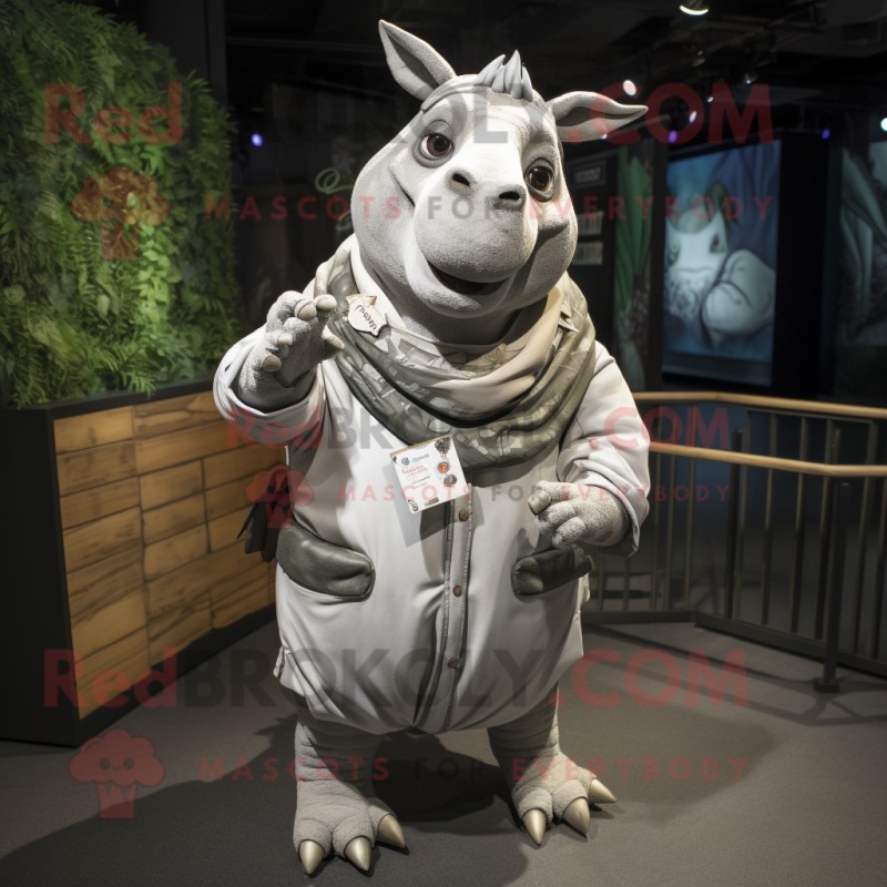Silver Rhinoceros mascot costume character dressed with a Cargo Shorts and Shawl pins Silver Rhinoceros mascot costume character dressed with a Cargo Shorts and Shawl pins