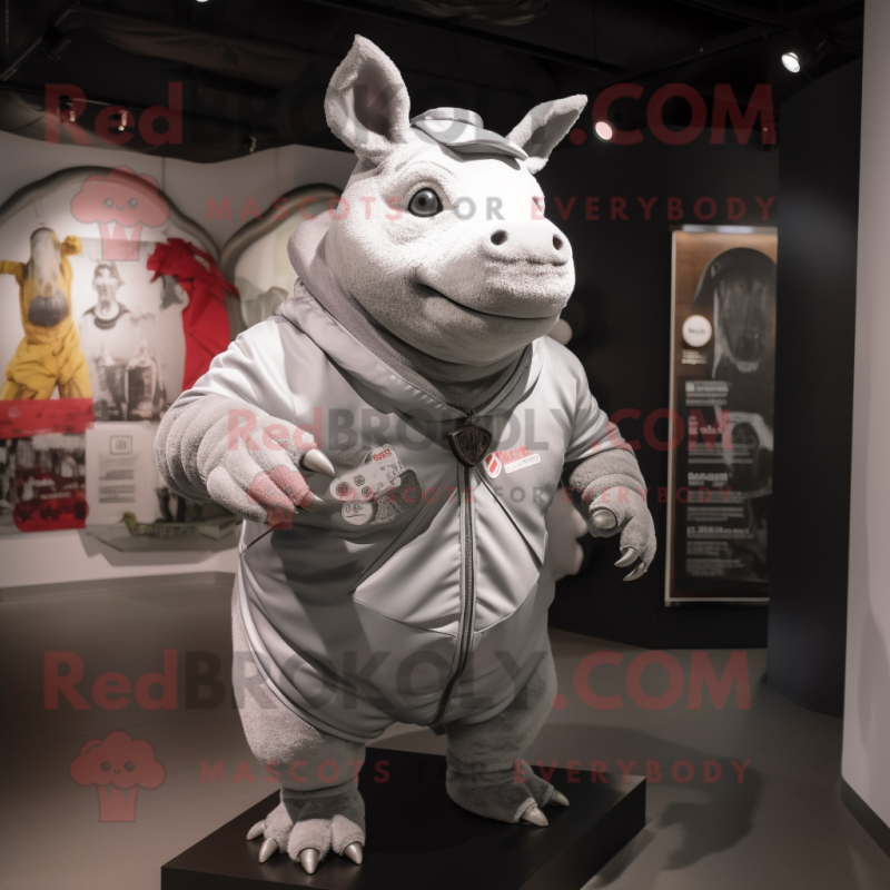 Silver Rhinoceros mascot costume character dressed with a Cargo Shorts and Shawl pins