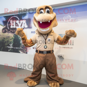 Brown Hydra mascot costume character dressed with a Polo Shirt and Suspenders