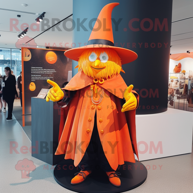 Orange Witch'S Hat mascot costume character dressed with a Blazer and Clutch bags