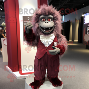 Maroon bavian maskot...