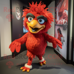 Red Harpy mascot costume character dressed with a Running Shorts and Headbands