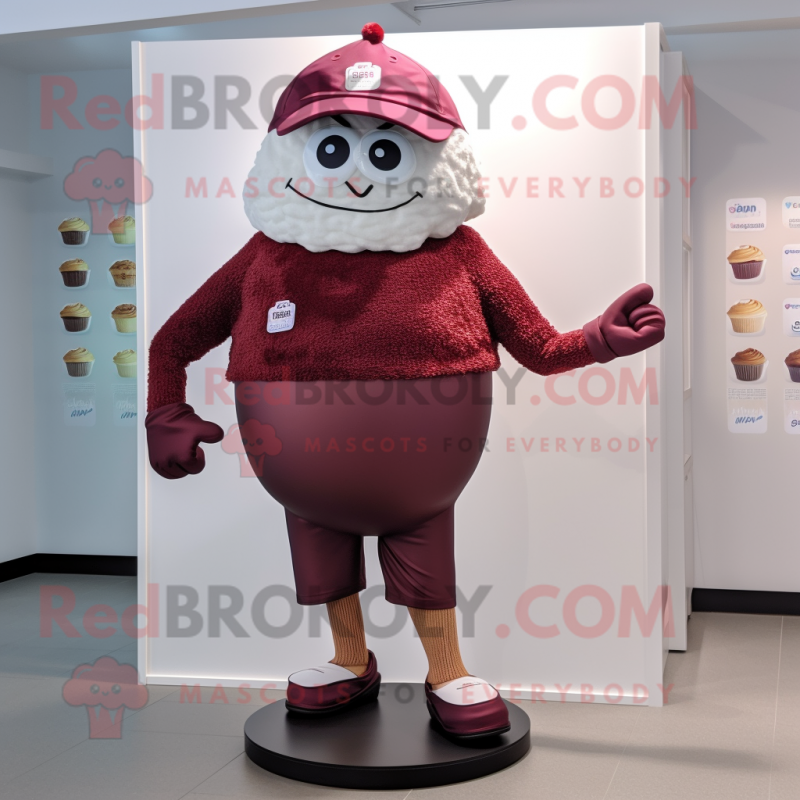 Maroon Cupcake mascot costume character dressed with a One-Piece Swimsuit and Hat pins