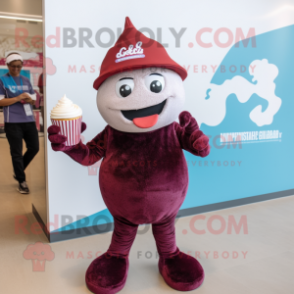 Maroon Cupcake mascot costume character dressed with a One-Piece Swimsuit and Hat pins