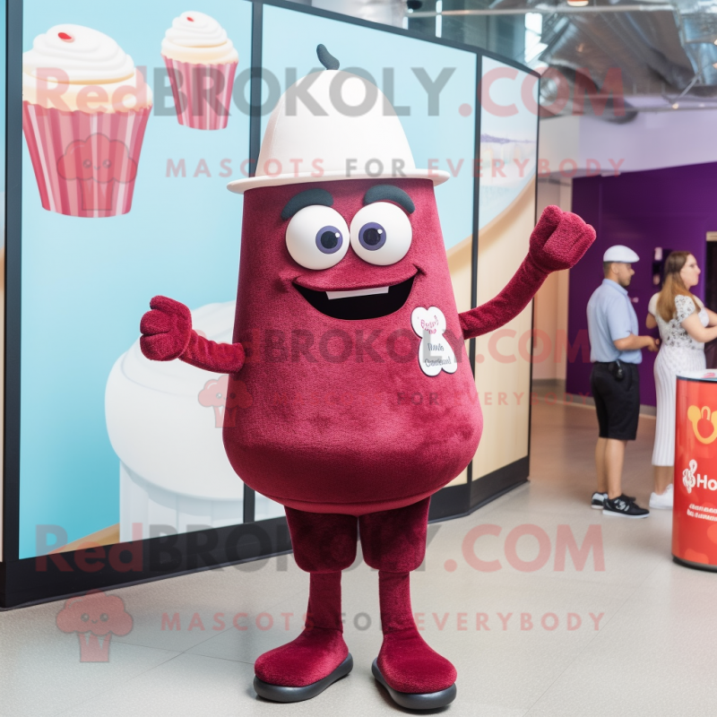 Maroon Cupcake mascot costume character dressed with a One-Piece Swimsuit and Hat pins