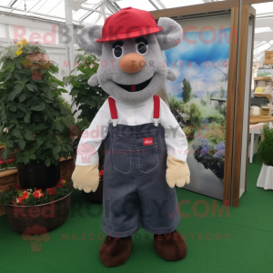 nan Goulash mascot costume character dressed with a Dungarees and Pocket squares