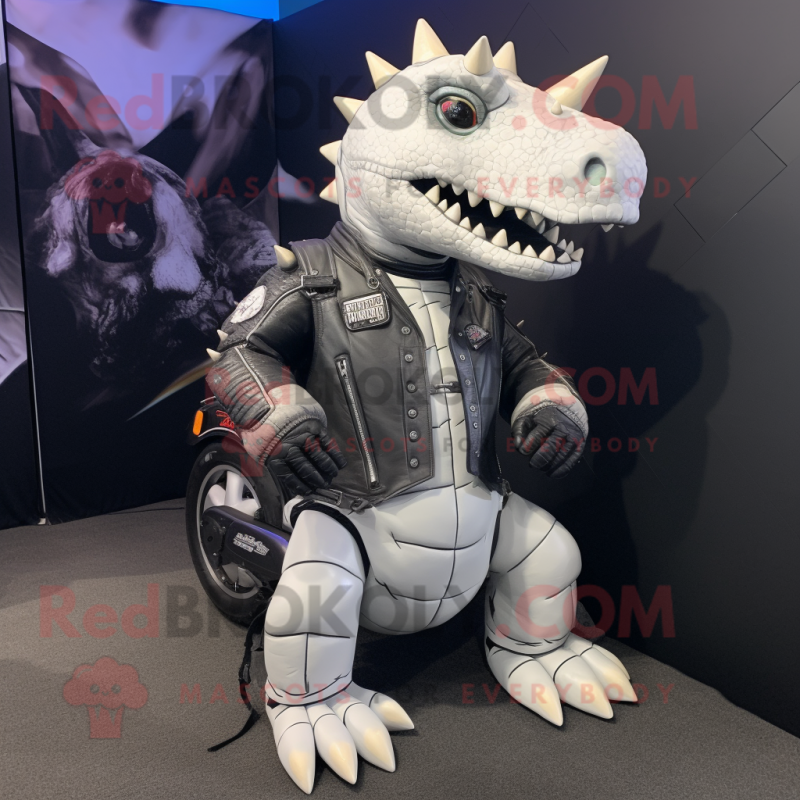 White Stegosaurus mascot costume character dressed with a Biker Jacket and Backpacks White Stegosaurus mascot costume character dressed with a Biker Jacket and Backpacks
