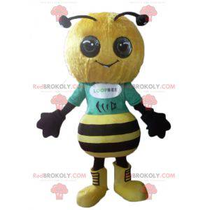 Zeer succesvolle en glimlachende gele en zwarte bijenmascotte -