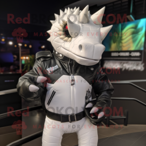 White Stegosaurus mascot costume character dressed with a Biker Jacket and Backpacks
