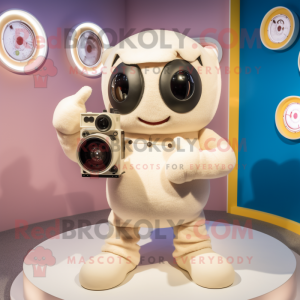 Cream Camera mascot costume character dressed with a Romper and Mittens