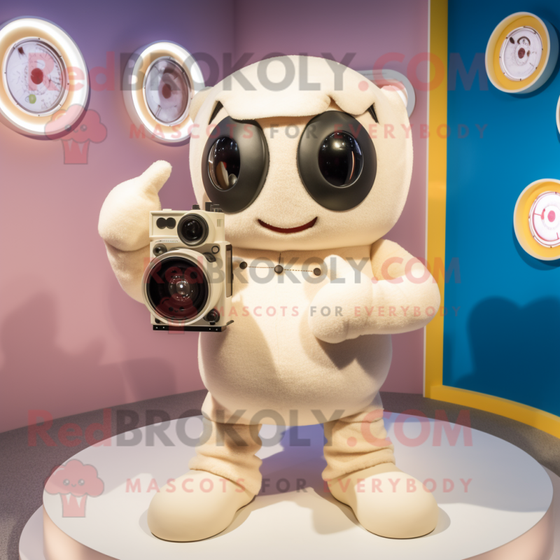 Cream Camera mascot costume character dressed with a Romper and Mittens Cream Camera mascot costume character dressed with a Romper and Mittens