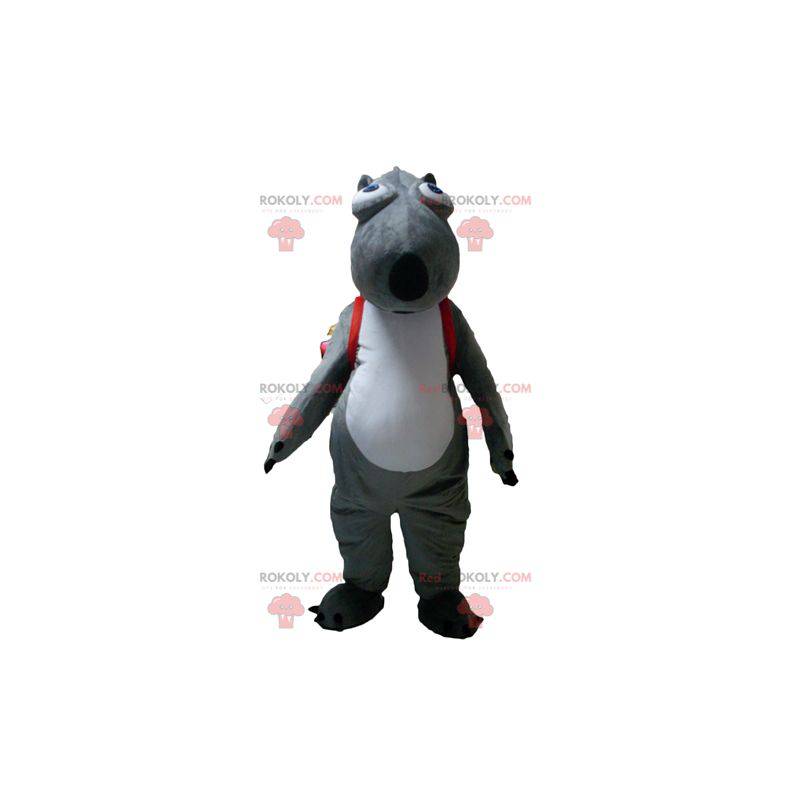 Mascota de castor animal gris y blanco con una mochila -
