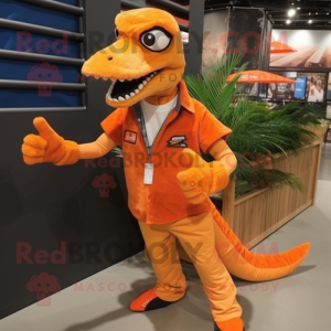 Orange Velociraptor mascot costume character dressed with a Chinos and Shoe laces