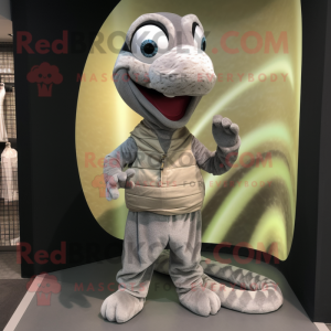 Silver Snake mascot costume character dressed with a Corduroy Pants and Brooches