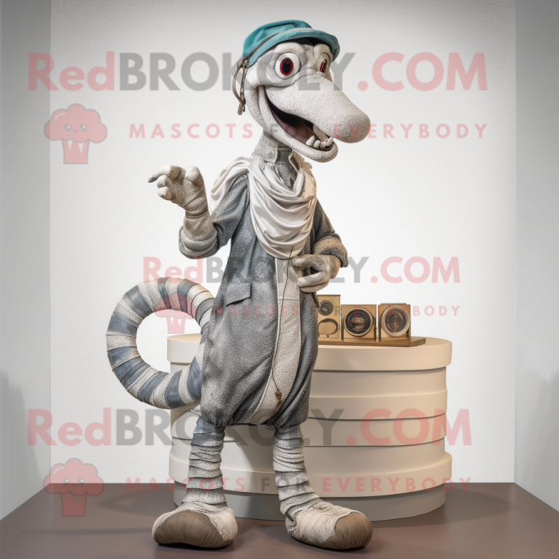 Silver Snake mascot costume character dressed with a Corduroy Pants and Brooches