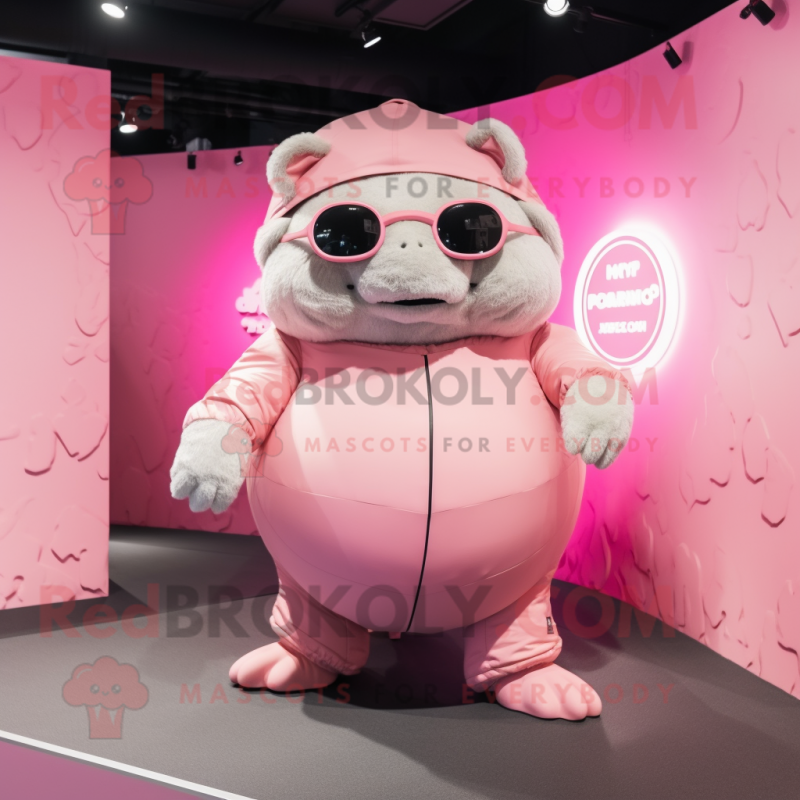 Pink Glyptodon mascot costume character dressed with a Romper and Sunglasses