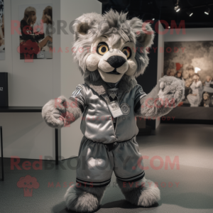 Gray Lion mascot costume character dressed with a Playsuit and Brooches