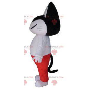 Black and white cat mascot in white and red outfit -