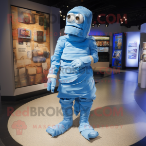 Blue Mummy mascot costume character dressed with a Overalls and Shoe clips