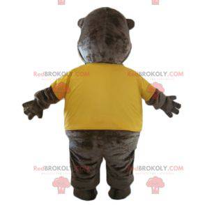 Brown beaver mascot with a yellow t-shirt - Redbrokoly.com