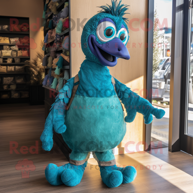 Turquoise Peacock mascot costume character dressed with a Overalls and Mittens