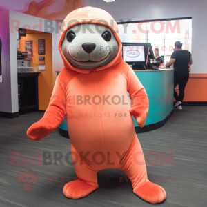 Peach Sea Lion mascot costume character dressed with a Leggings and Beanies