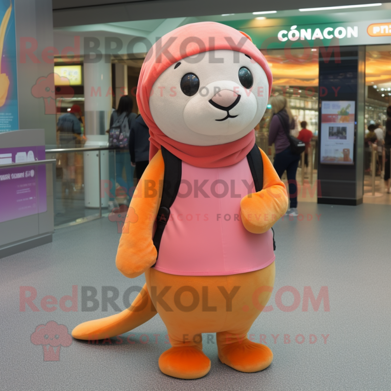 Peach Sea Lion mascot costume character dressed with a Leggings and Beanies Peach Sea Lion mascot costume character dressed with a Leggings and Beanies