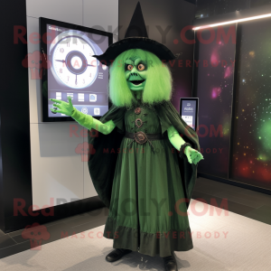 Green Witch mascot costume character dressed with a Shift Dress and Digital watches
