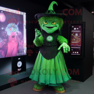 Green Witch mascot costume character dressed with a Shift Dress and Digital watches