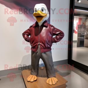 Maroon Geese mascot costume character dressed with a Leather Jacket and Ties