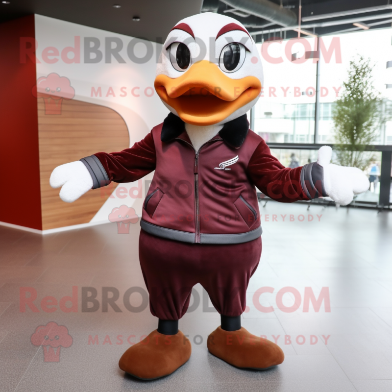 Maroon Geese mascot costume character dressed with a Leather Jacket and Ties Maroon Geese mascot costume character dressed with a Leather Jacket and Ties