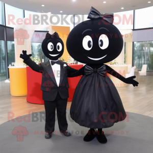 Black Engagement Ring mascot costume character dressed with a Cocktail Dress and Bow ties