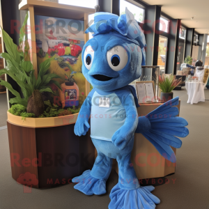 Sky Blue Betta Fish mascot costume character dressed with a Henley Shirt and Cummerbunds