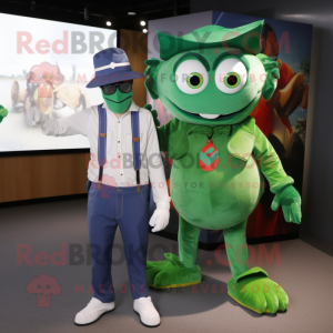 Green Devil mascot costume character dressed with a Oxford Shirt and Berets