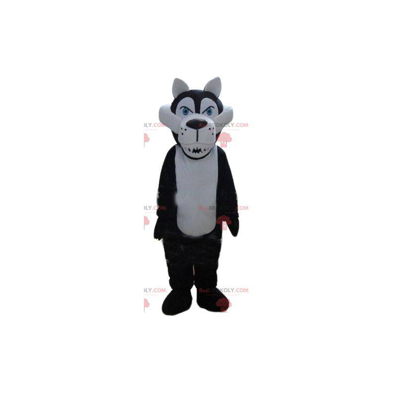 Witte en zwarte wolfsmascotte die er woest uitziet -