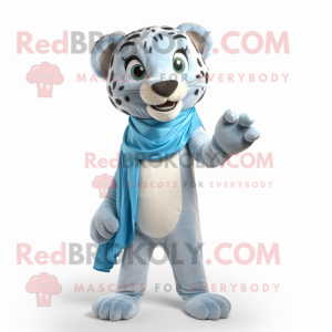 Sky Blue Cheetah mascot costume character dressed with a Chinos and Wraps