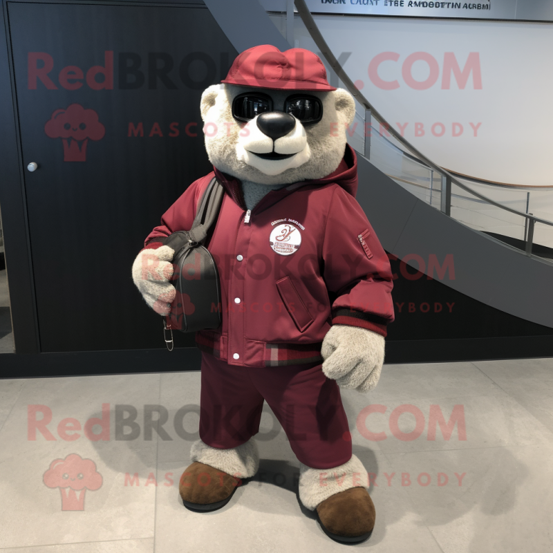 Maroon But mascot costume character dressed with a Bomber Jacket and Handbags