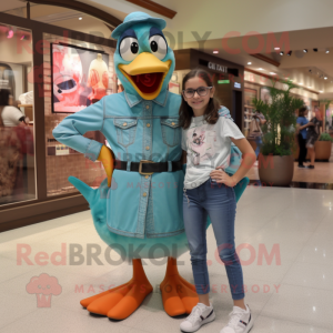 Turquoise Goose mascot costume character dressed with a Mom Jeans and Bracelet watches
