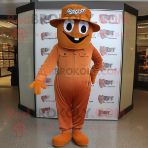 Rust Aglet mascot costume character dressed with a Jumpsuit and Hat pins