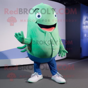 Green Blue Whale mascot costume character dressed with a Suit and Shoe laces