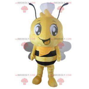 Mascotte ape gialla e nera con un cappello sulla testa -
